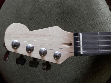 4 String Cigar Box Guitar Lessons 的图像结果