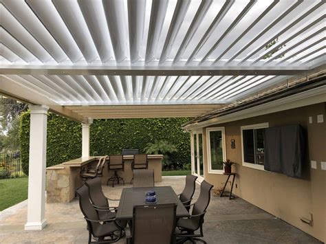 Equinox louvered & Maxxwood combination patio cover designs - Alumawood ...
