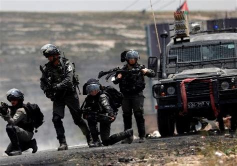 IN PICS | Palestinians protest on 70th 'catastrophe day', burn Trump ...