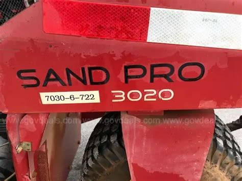 2006 Toro Sand Pro 3020 with infield groomer attachment | GovDeals