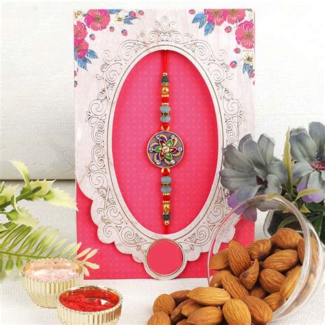 Send Floral Design Rakhi with Almond - UK Online | Rakhibazaar.com