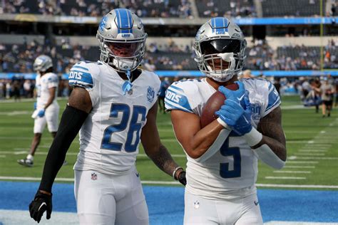 Download Detroit Lions Players Celebrating Wallpaper | Wallpapers.com