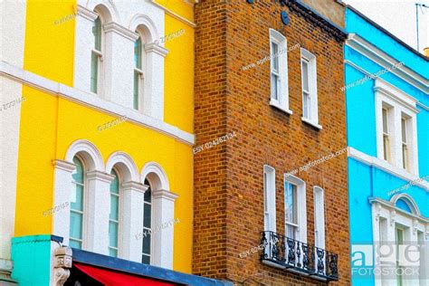 notting hill area in london england old suburban and antique yellow ...