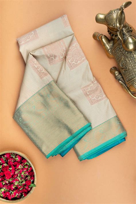 Offwhite and aqua blue semi silk saree – Priyangaa