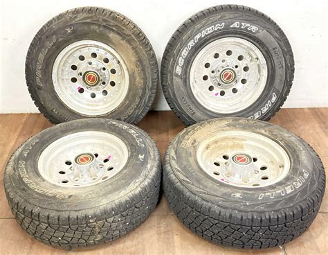 Lot - (4) Pirelli Scorpion Atr LT 235/75 R15 Tires, Rims