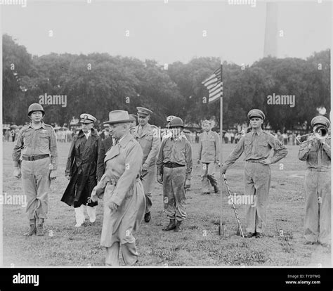 Photograph of President Truman with other dignitaries during his review ...