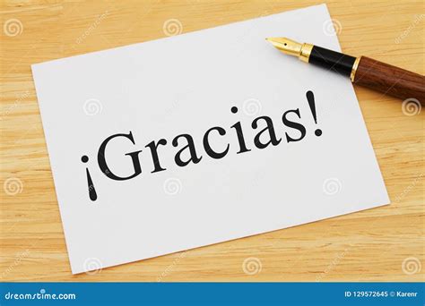 Spanish Thank You Message on Desk Stock Image - Image of note, desk: 129572645