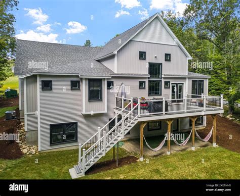 The beautiful exterior of a modern custom new England colonial home ...