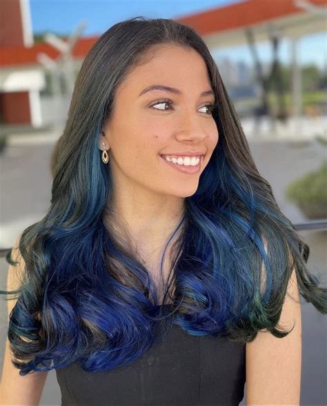 Unraveling the Enigma: Black Hair, Blue Eyes, and Nature’s Palette