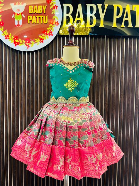 Green Top And Rani Pink Color Bottom Meenakari Silk Pattu Pavada - Pon ...