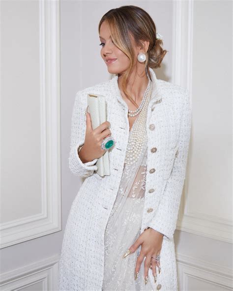 Natasha Poonawalla wears white Sabyasachi saree with bandhgala jacket ...