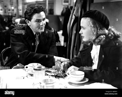 FOUR DAUGHTERS, John Garfield, Priscilla Lane, 1938 Stock Photo - Alamy