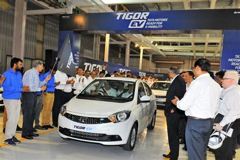 Tata Motors rolls out first batch of Tigor electric sedan from Sanand ...