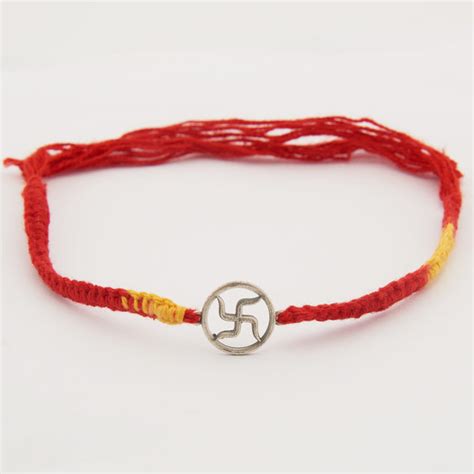 Swastika Circular Shaped Rakhi – Abaran Timeless Jewellery Pvt.Ltd