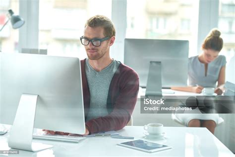 Elevated view of a busy open plan office.
