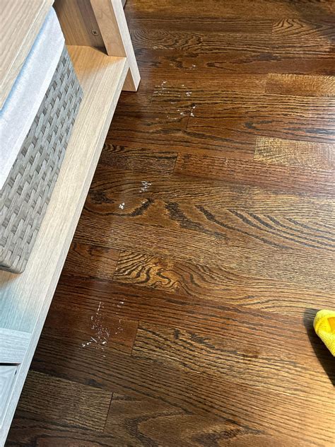 Wrapping paper finish came off on flooring, how do I remove? : r/howto