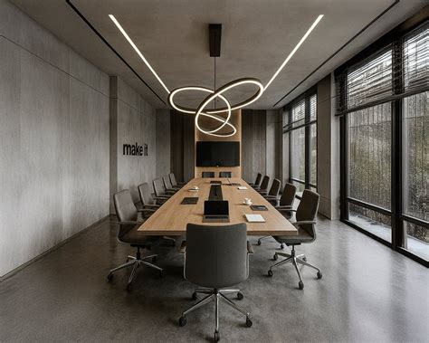 Industrial-Modern Conference Room with Sculptural Flair and Focused Ut ...