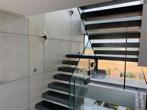 Concrete Cantilevered Floating Stairs | LIVING CONCRETE LTD | NBS Source