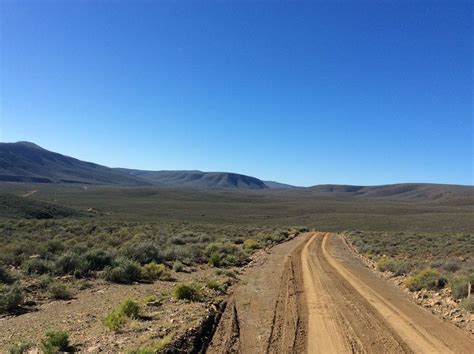 sky, clear sky, outdoors, road, environment, non-urban scene ...