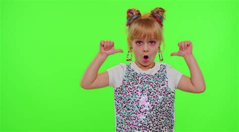 Cheerful funny teen school girl kid dancing filming video using mobile ...