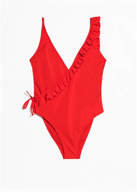 Our Favorite Plunge One-Piece Swimsuits | Who What Wear