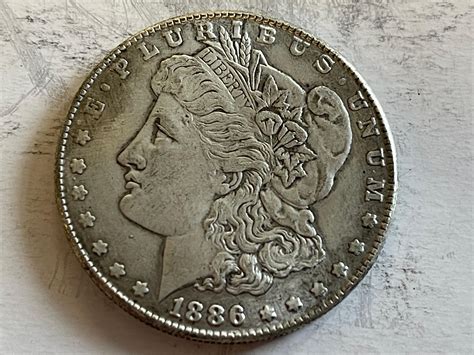 Lot - 1886 O Morgan Silver Dollar