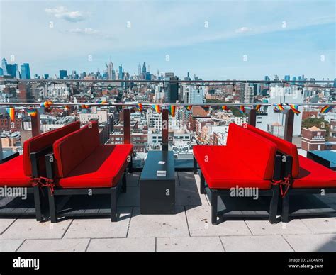 empty seats looking over Midtown Manhattan from The Crown rooftop bar ...