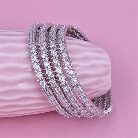 Sukkhi Enthralling Silver Rhodium Plated Cz Contemporary Bangle For Wo