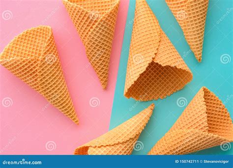 Ice Cream Waffle Cones on Pastel Pink and Blue Background Stock Image ...