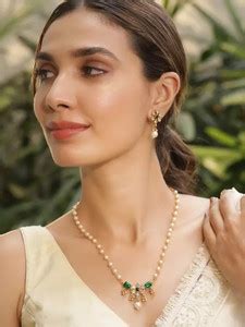 brado jewellery Brass Gold-plated Gold, Green Jewellery Set Price in ...