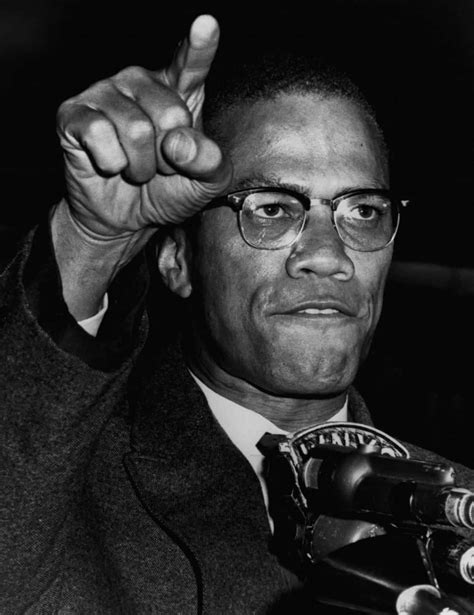 Download Malcolm X Speaking Pointing Wallpaper | Wallpapers.com