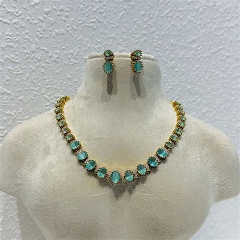 Brilliant Elegant Glamorous ocean blue stone with ad joints golden nec ...