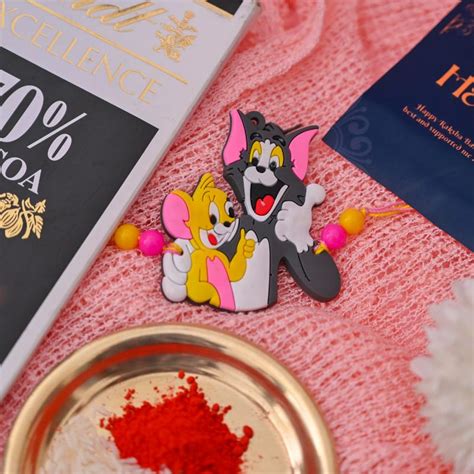 Send Tom & Jerry Rakhi with Lindt Luxe Treat Online