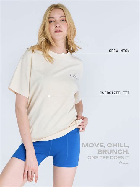 Cream Graphic Oversized Tee - Women – CAVA Athleisure Pvt Ltd