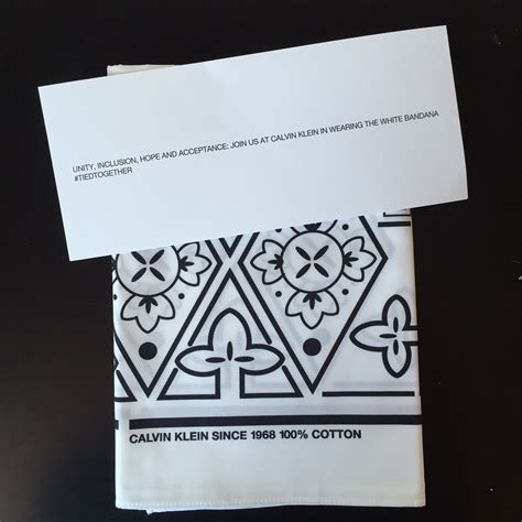 The meaning behind Raf’s white Calvin Klein bandana invites Womenswear ...