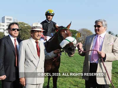 Dr Mustafa Alam Khan and Ahmed Alam Khan receiving the Stayers' Cup ...