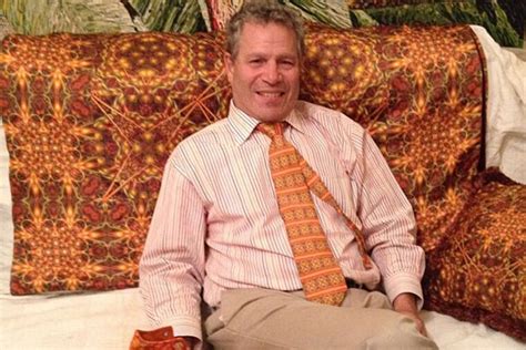 He translates his artwork into wearable silk accessories