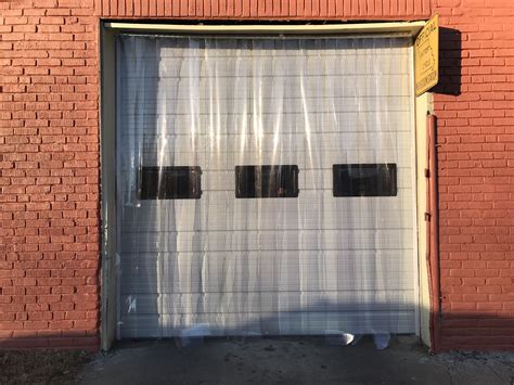 Commercial ribbed garage door with wide view windows and commercial ...