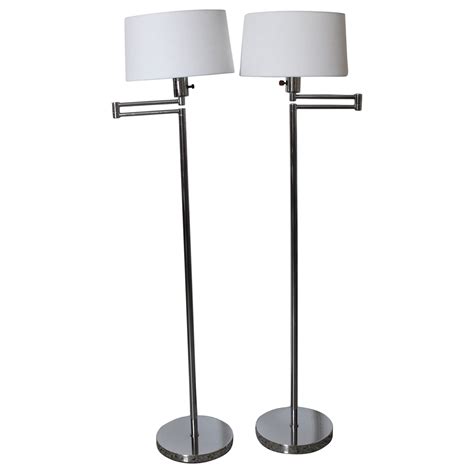 Pair of brass Chapman adjustable reading lamps at 1stDibs