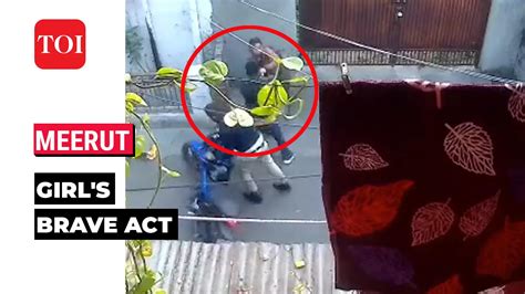 On cam: Brave Meerut girl fights off earring snatchers, pulls them off bike