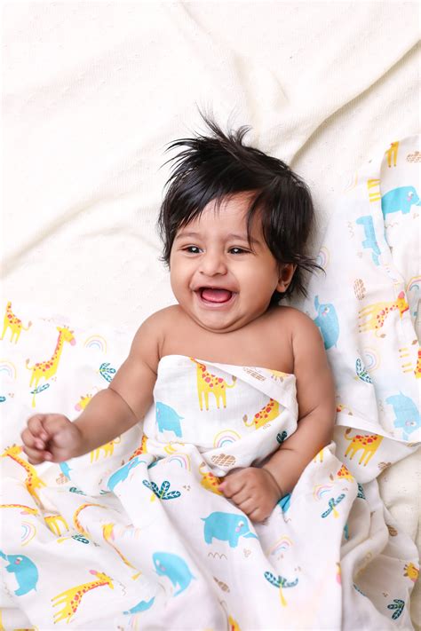 Avail swaddle wrap and baby towels | Smiley Buttons