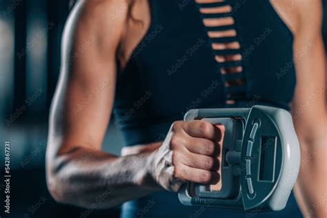 Using Hand Dynamometer for Grip Strength Test Stock Photo | Adobe Stock
