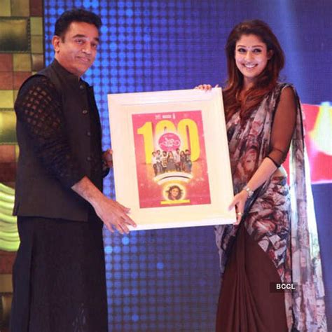 Kamal Hassan and Nayanthara pose for a photo during the success meet of ...