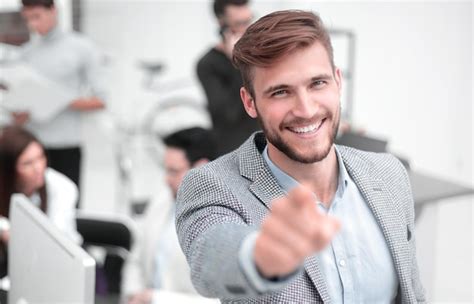 Group of People Standing in Office Pointing 的图像结果