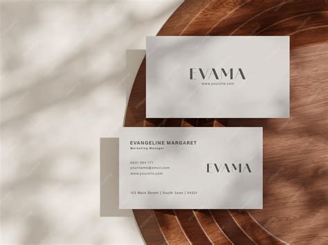 Modern business card design showcase on wooden texture | Premium PSD