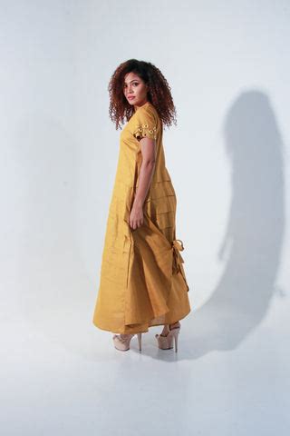 Ochre yellow maxi A-line dress with self panels and a tie-up detail at ...