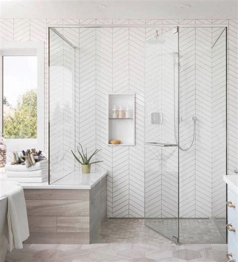 Coastal bathroom at the walk-in shower and herringbone tile White ...