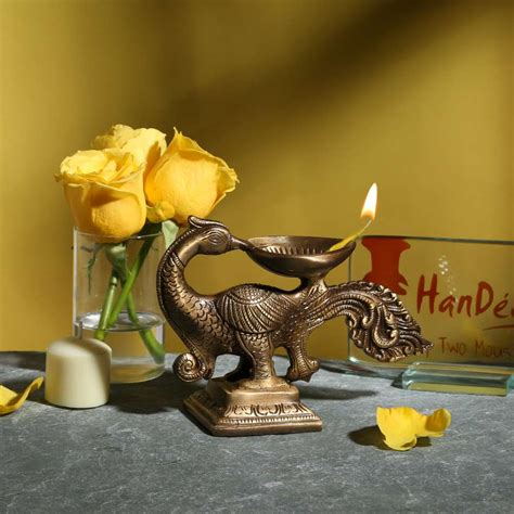 Buy Peacock Oil Wick Diya Brass Showpiece Online at Best Price
