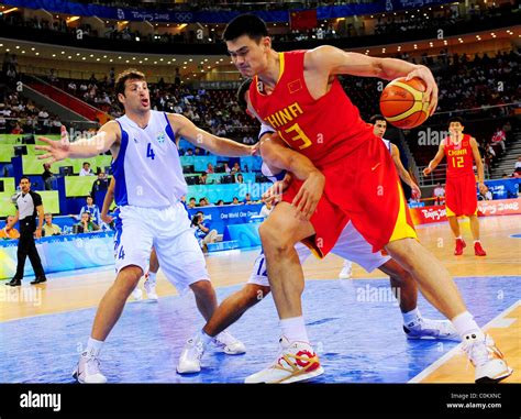 China's Yao Ming China play Greece at the Olympic Basketball Stock ...
