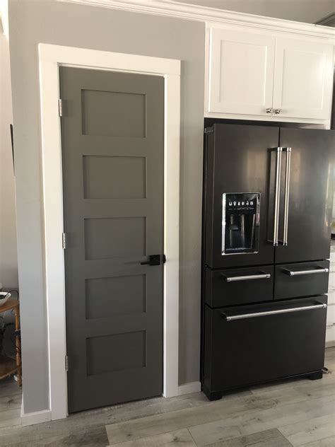 Dark Grey Farmhouse Doors | Black interior doors, Grey walls white trim ...